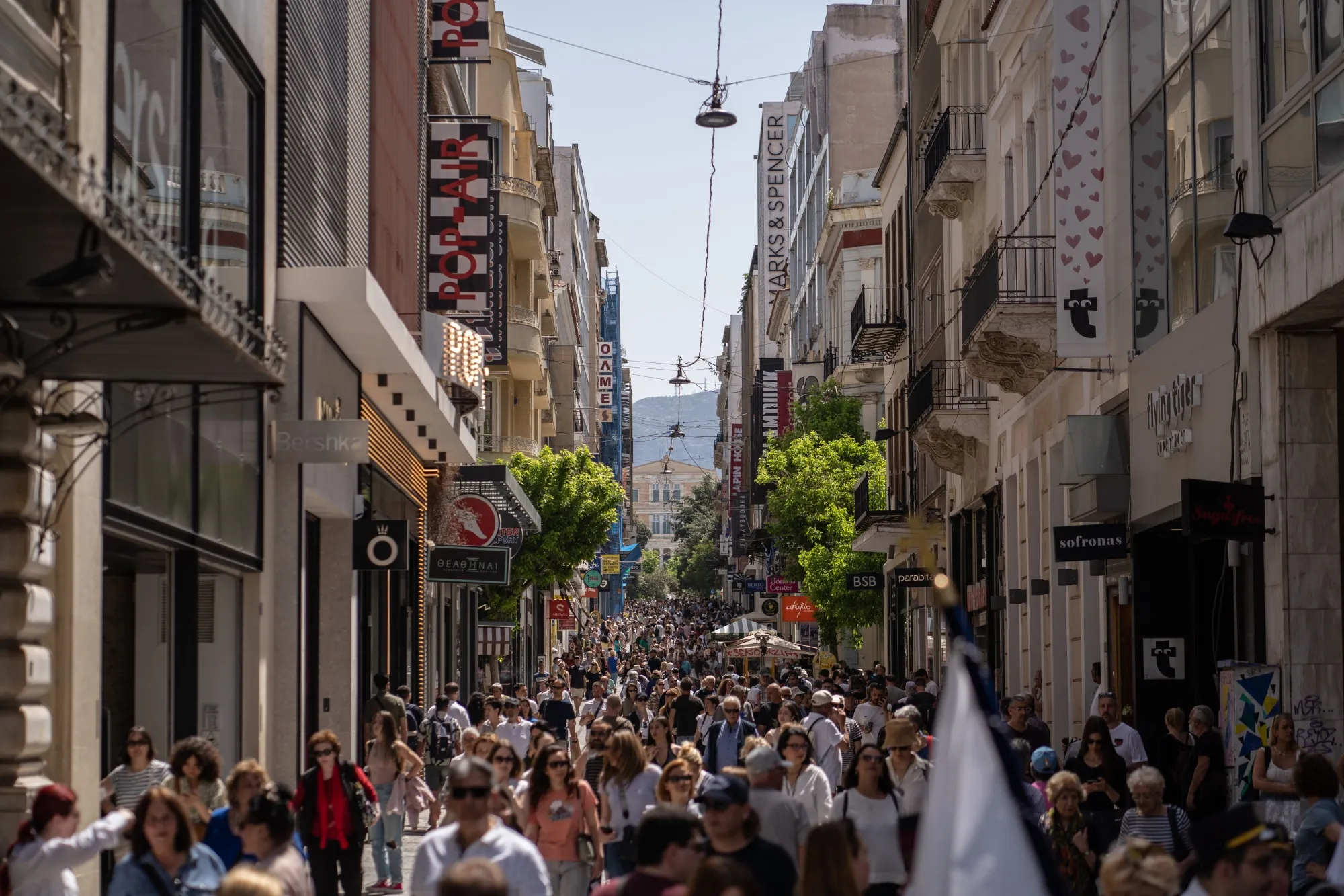 Shoppers on Ermou Street, a busy thoroughfare in Athens, on May 10, 2025.