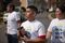 From left to right, Libre Initiative volunteers George Faura, David Silva, and Carmin Chavez canvass neighborhoods in Charlotte, North Carolina, on March 12, 2016.