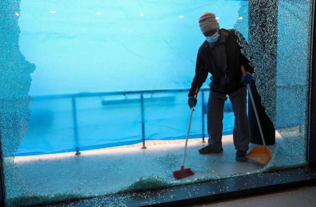 Cleaning up after an attack in Erbil.