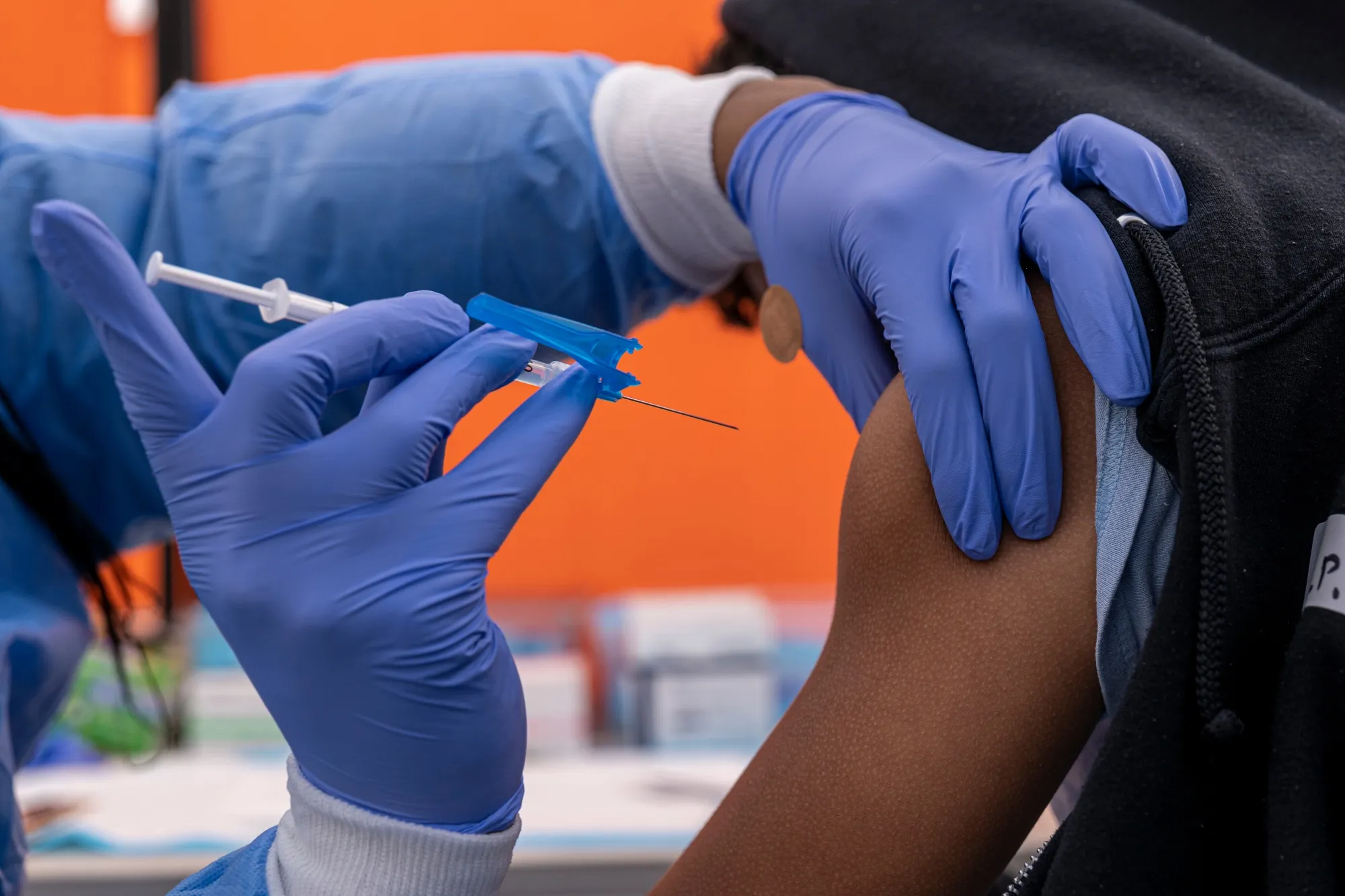 A healthcare worker administers a Pfizer-BioNTech Covid-19 vaccine&nbsp;in San Francisco.