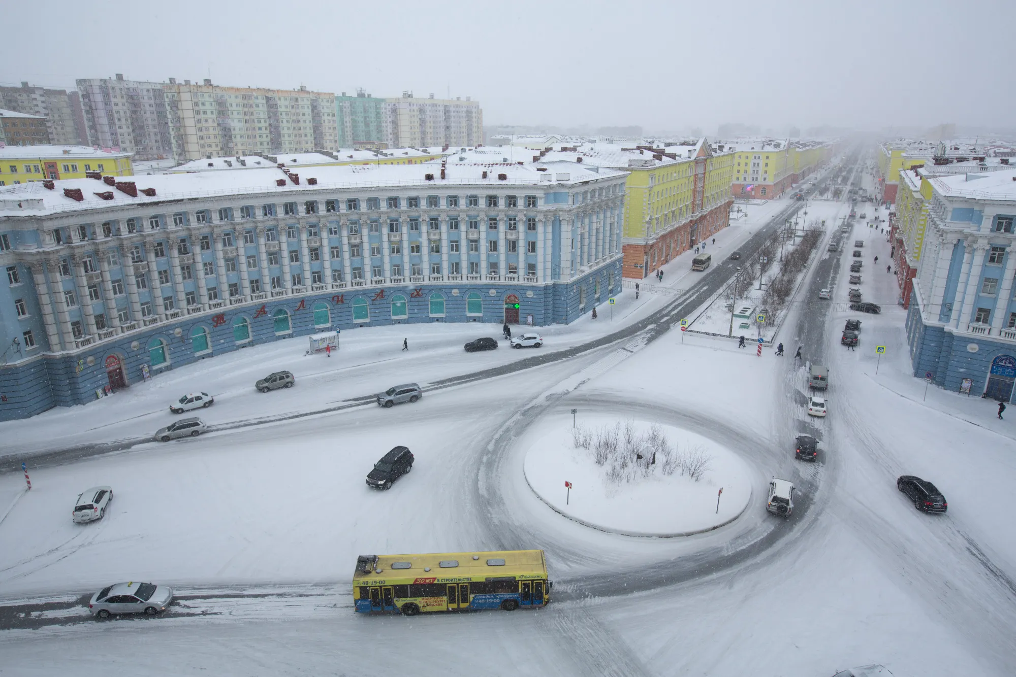 Snow covers the streets of Gvardeyskaya square in Norilsk, Russia.