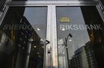 A sign on an entrance reads Sveriges Riksbank at the Swedish central bank headquarters in Stockholm, Sweden.