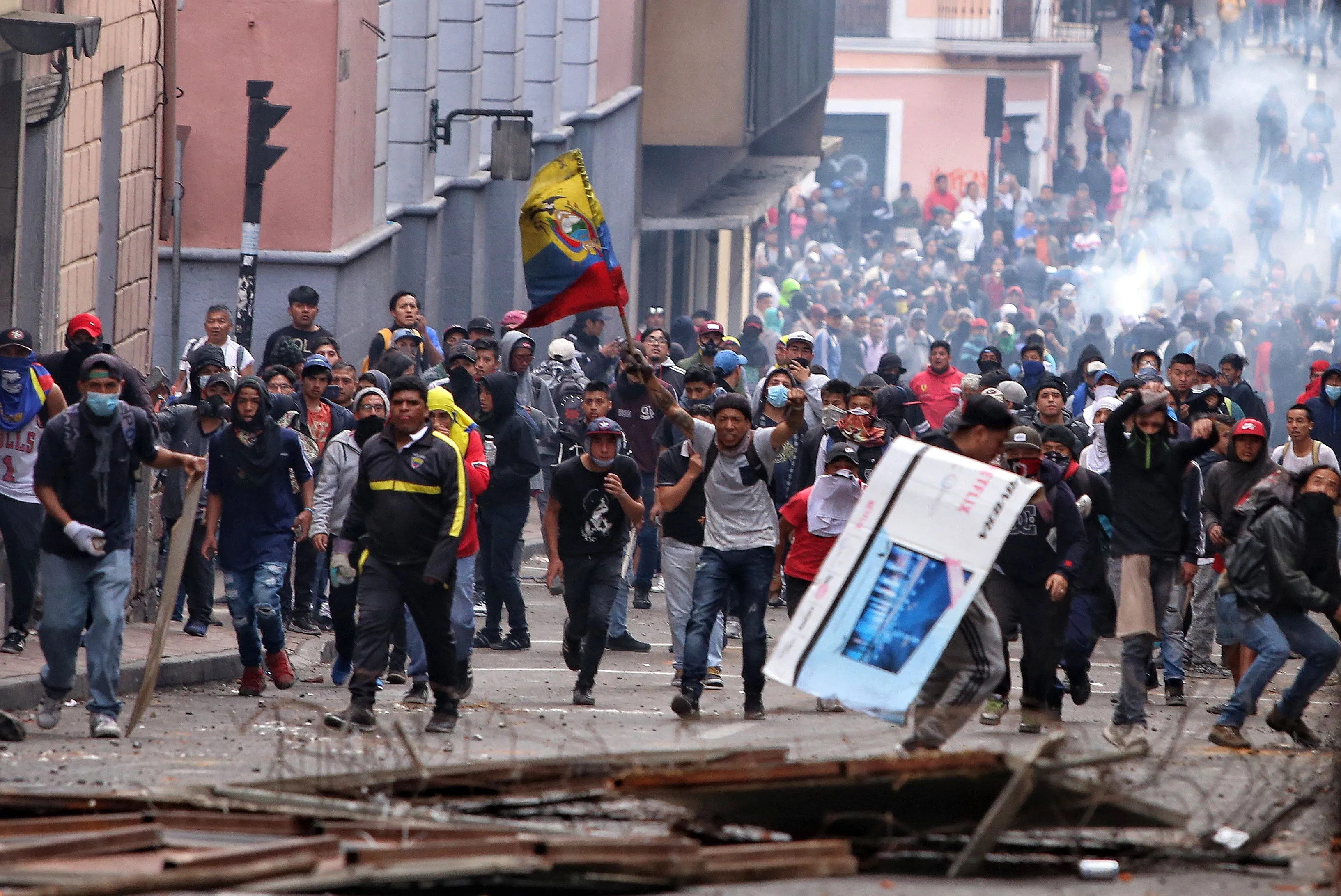 Demonstrators clash with the police in Quito on Oct. 7.