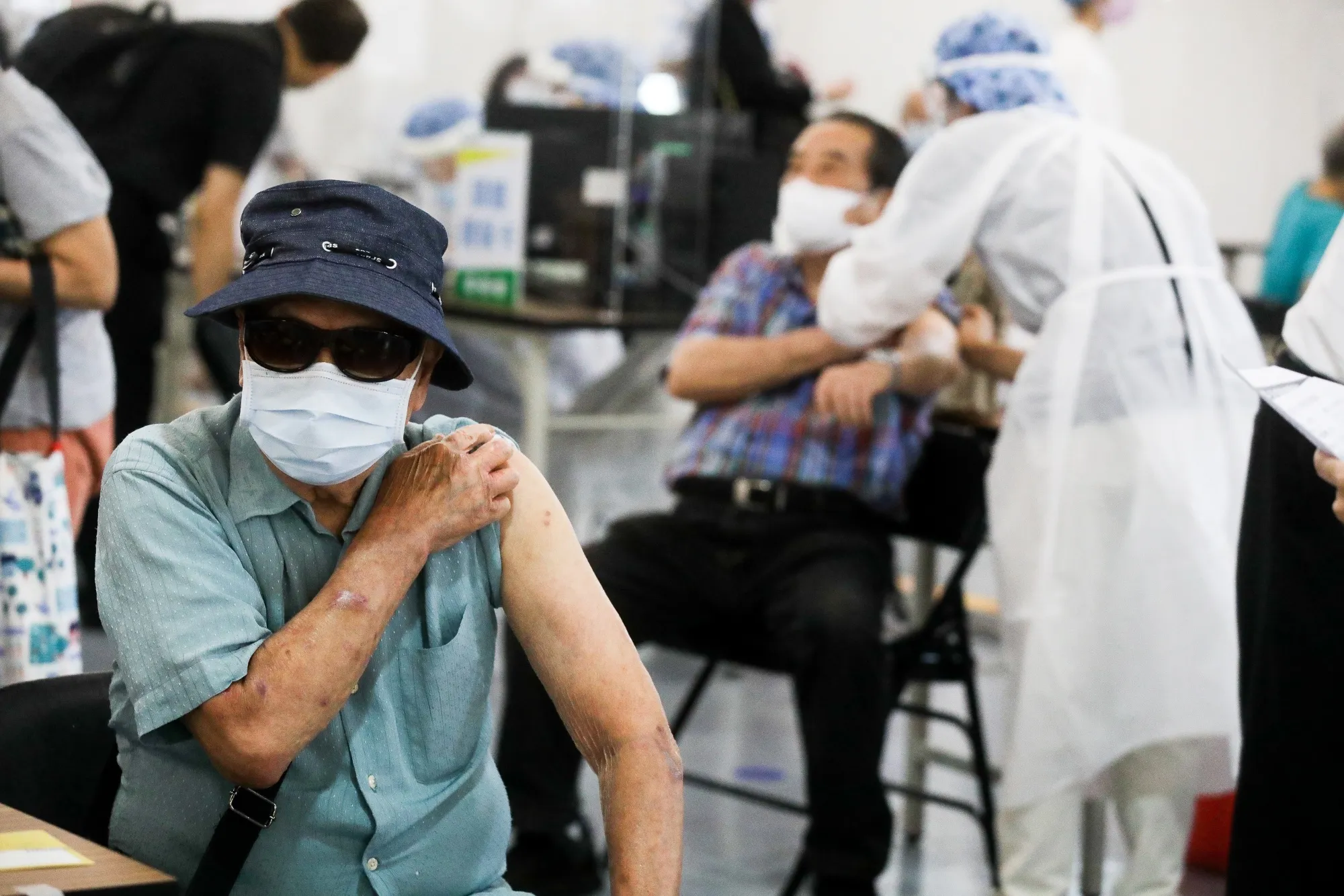 People receive injections at a vaccination center n Taipei, Taiwan.