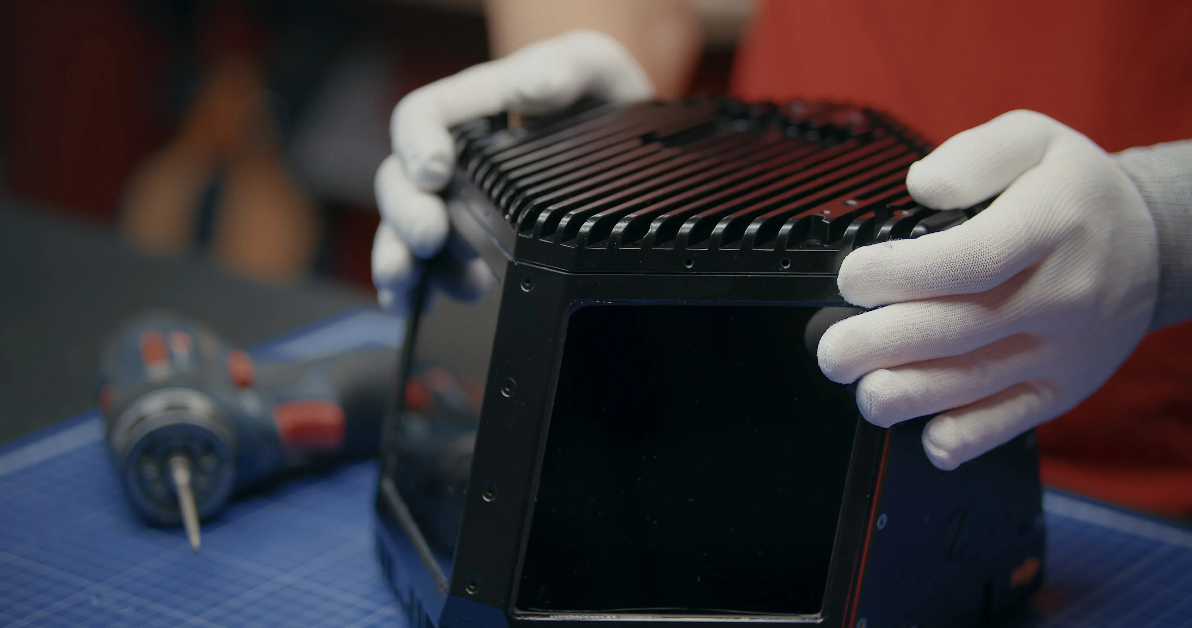 A lidar sensor under assembly.