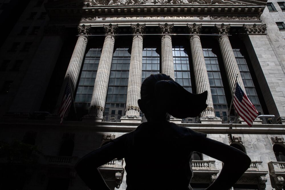 The "Fearless Girl" statue stands outside the New York Stock Exchange (NYSE) in New York, U.S.