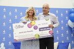 Joe Thwaite, 49, and Jess Thwaite, 46, from Gloucestershire celebrate after winning the record-breaking EuroMillions jackpot of £184 million.