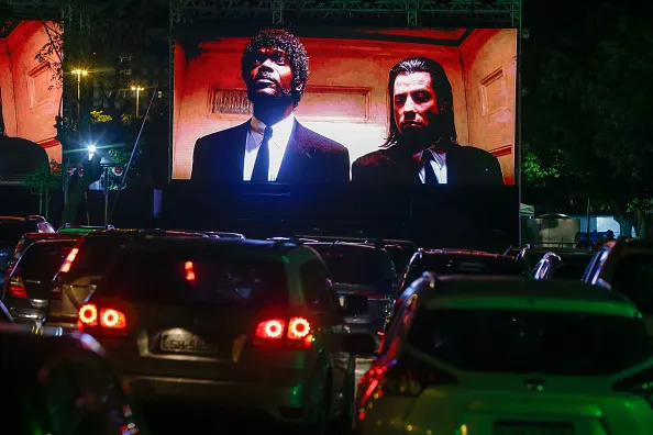 Jules and Vincent put on their game faces at Rio de Janeiro’s&nbsp;Cine Lagoa Drive-in.&nbsp;