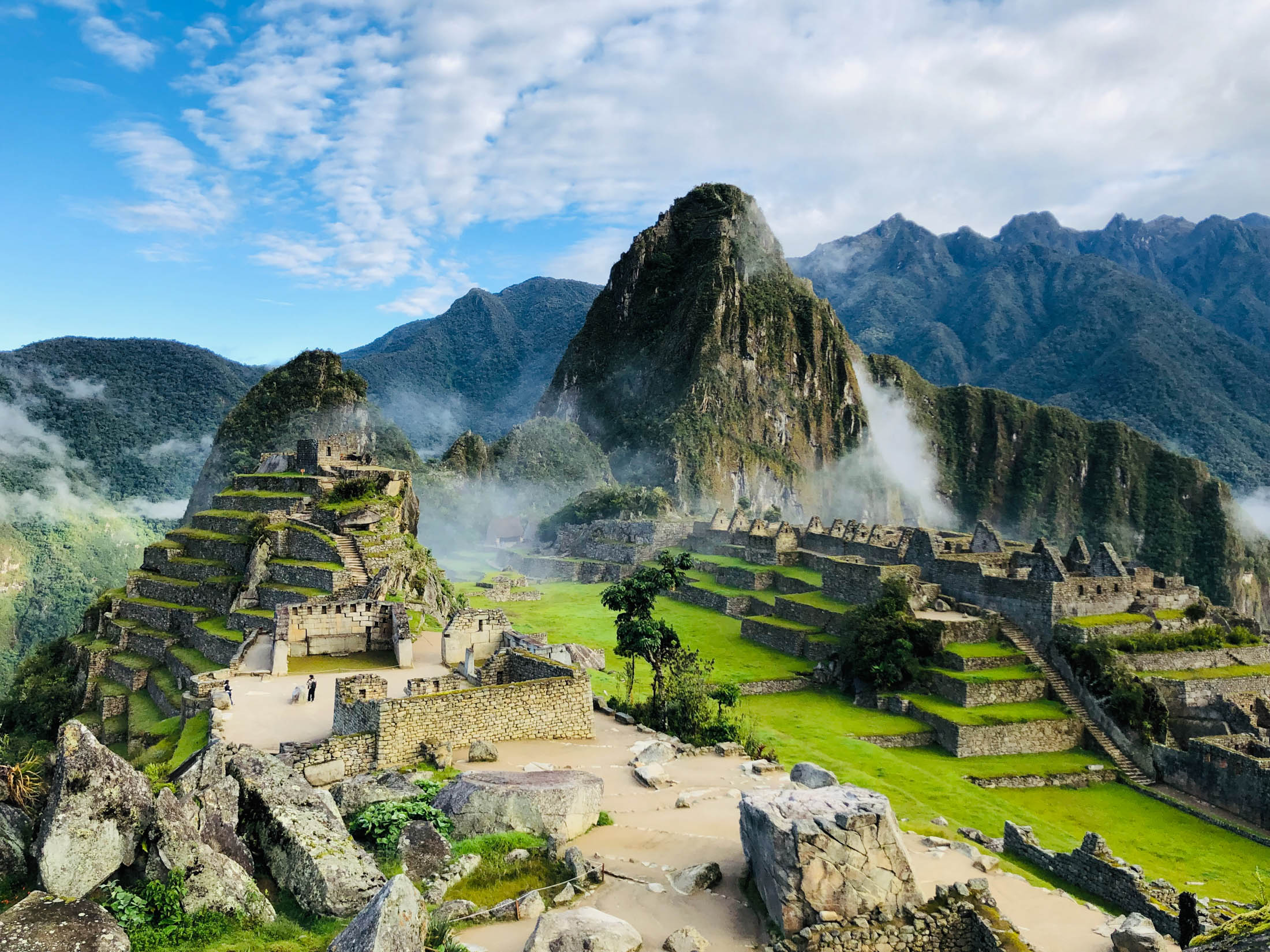 Huayna Picchu rises behind&nbsp;the Inca citadel of Machu Picchu in the early morning light.