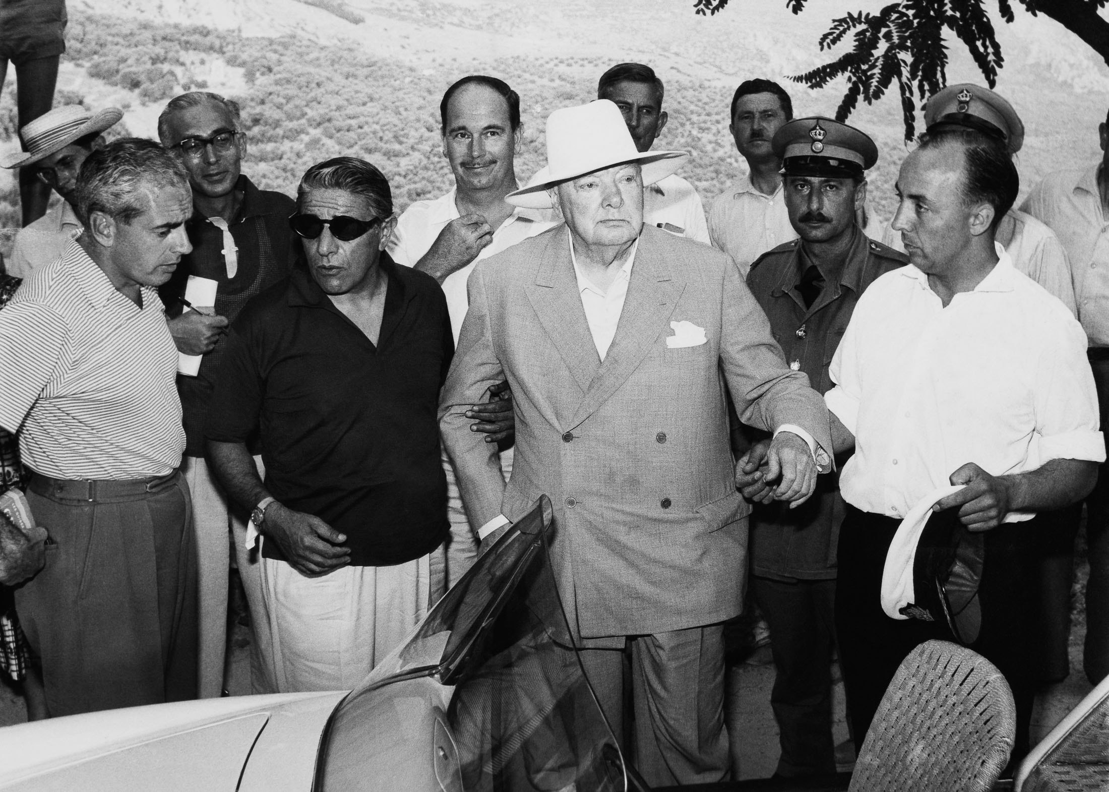 Winston Churchill (center) And Aristotle Onassis (in sunglasses), in 1959.&nbsp;