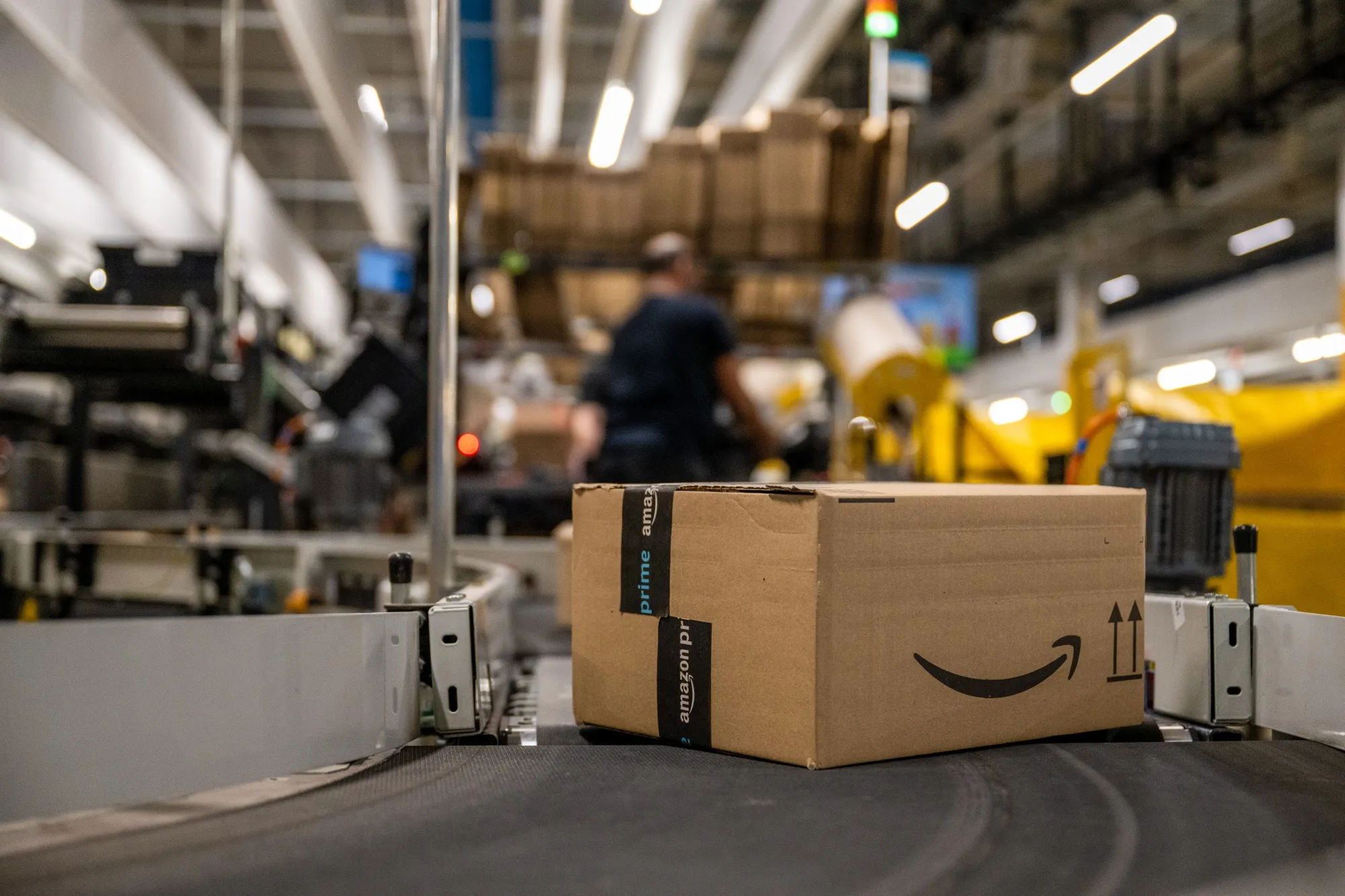 An order moves along a conveyor belt at a Amazon.com Inc. fulfilment center.