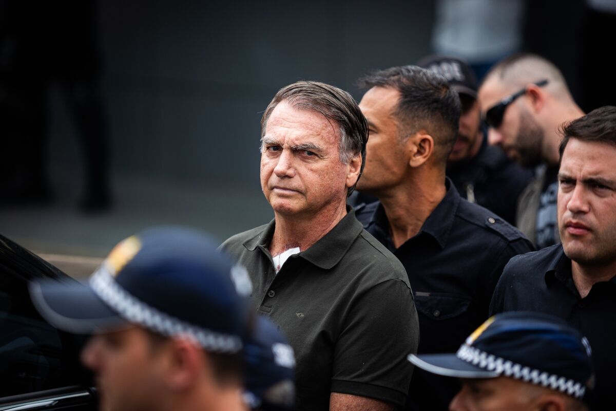 Brazil's Bolsonaro Hospitalized After Feeling Unwell, Son Says - Bloomberg