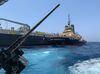 A picture taken during a guided tour by the US Navy (NAVCENT) shows the Japanese oil tanker Kokuka Courageous off the port of the Gulf emirate of Fujairah on June 19, 2019. - The Japanese tanker attacked in the Gulf of Oman last week was damaged by a limpet mine resembling Iranian mines, the US military in the Middle East said today. Commander Sean Kido of the US Navy told reporters that the US military has recovered biometric information of the assailants on the Japanese ship including "hand and finger prints." Two oil tankers were damaged in twin attacks close to the Iranian coast on June 13, just outside the strategic Strait of Hormuz. (Photo by Mumen KHATIB / AFP) (Photo credit should read MUMEN KHATIB/AFP/Getty Images)