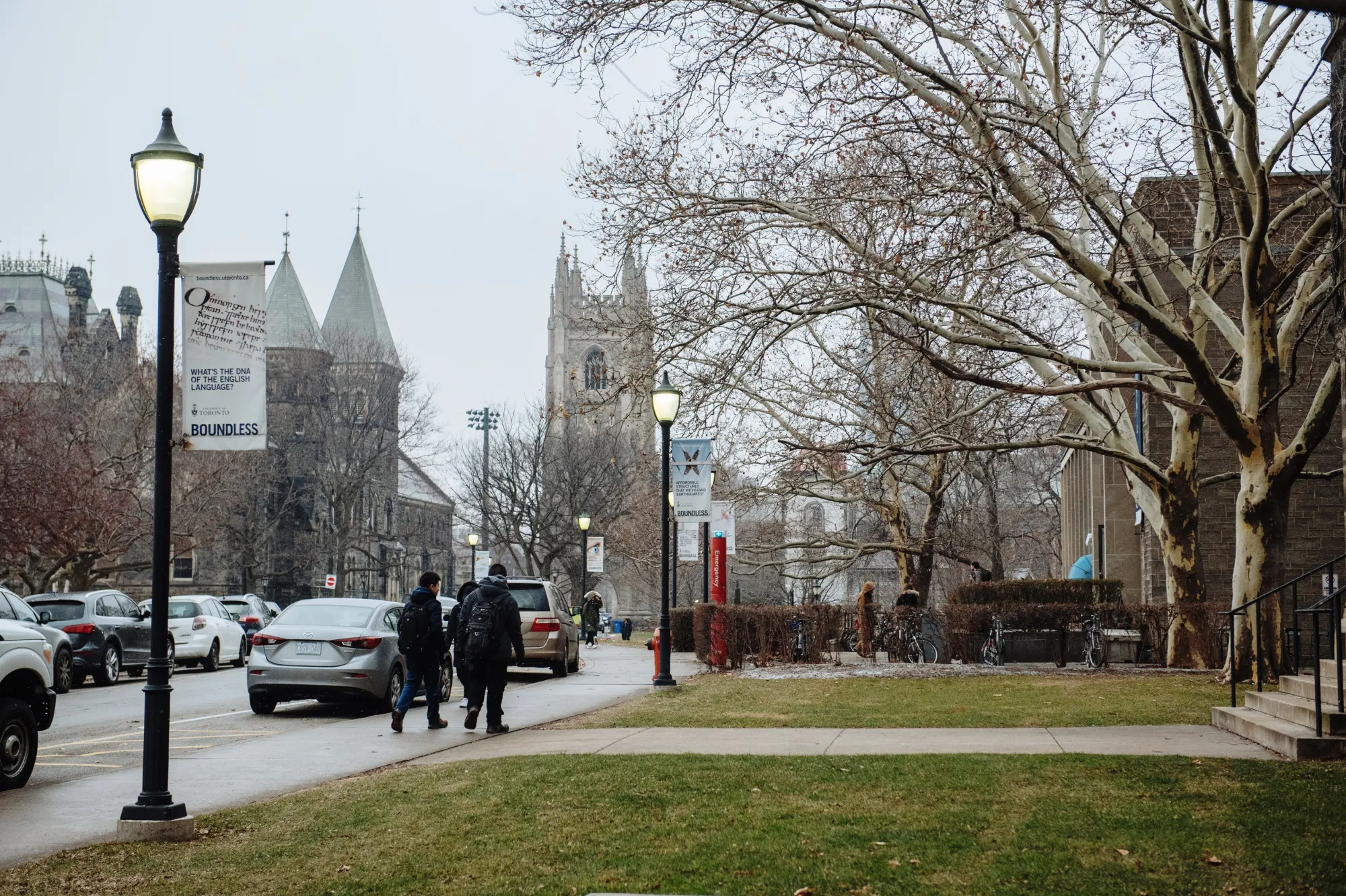Students walk through the University of Toronto campus.