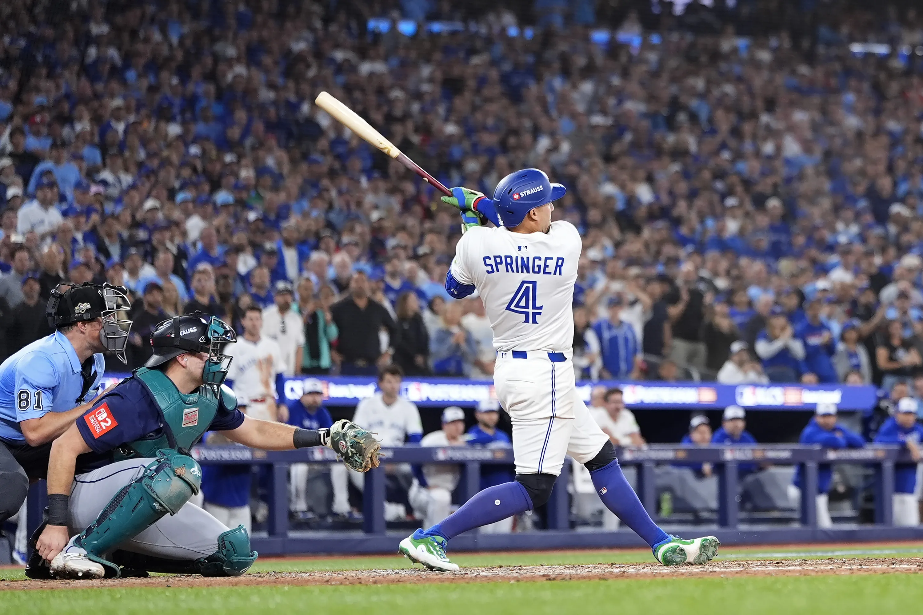 George Springer of the Toronto Blue Jays hits a three-run home run in the seventh inning at the Rogers Centre on Oct. 20 in Toronto.