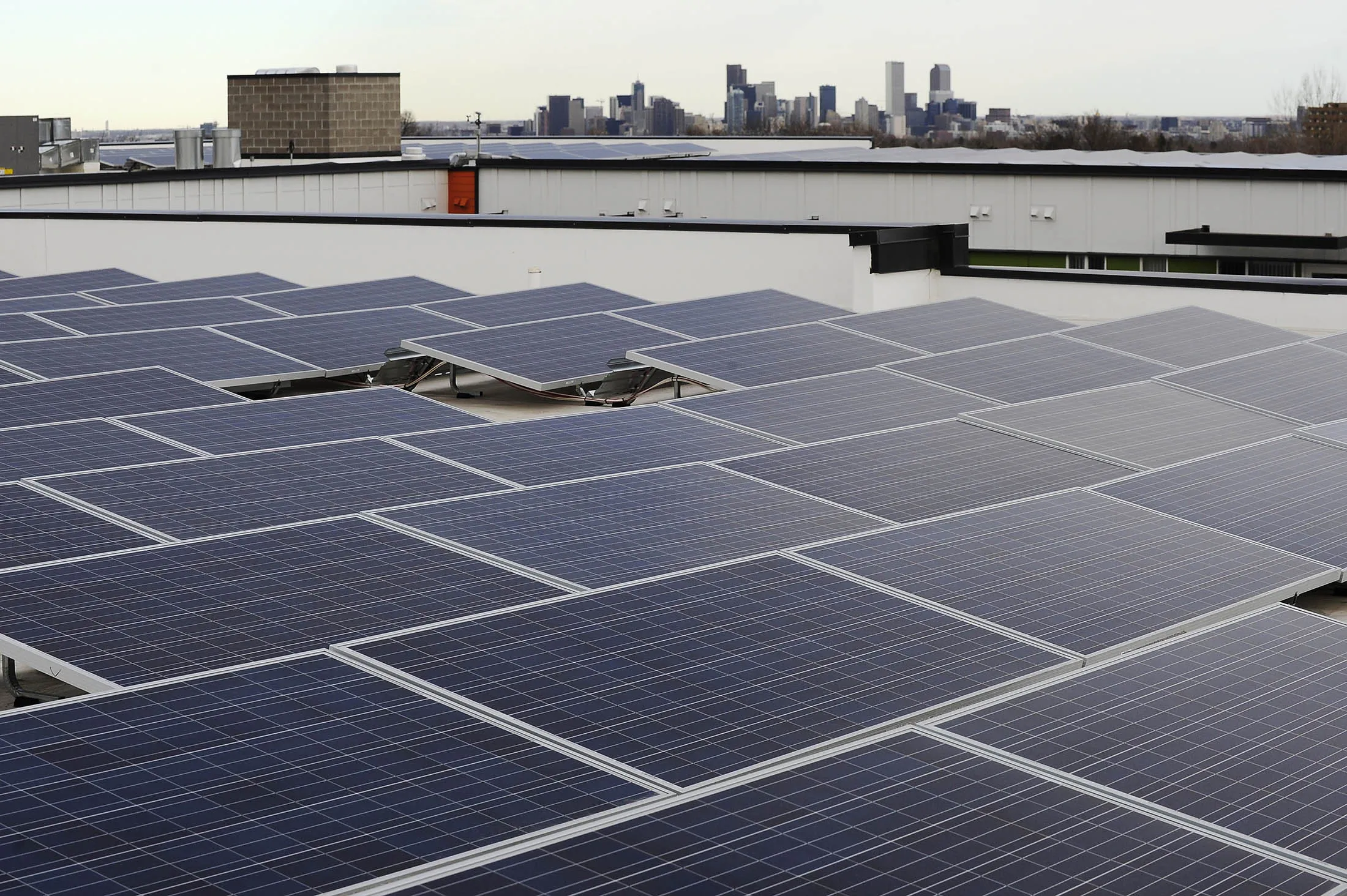 LAKEWOOD, CO - DECEMBER 11: Solar panels cover the roof at CityScape at Belmar on December 11, 2015, in Lakewood, Colorado. CityScape at Belmar, a recently opened 130-unit senior community, incorporates sustainable features including a solar panel array that provides 49 percent of the buildings energy needs.
