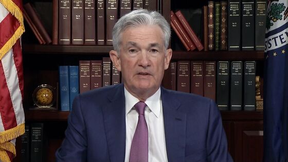 Powell Says Taper Could Start in 2021, With No Rush on Rate Hike