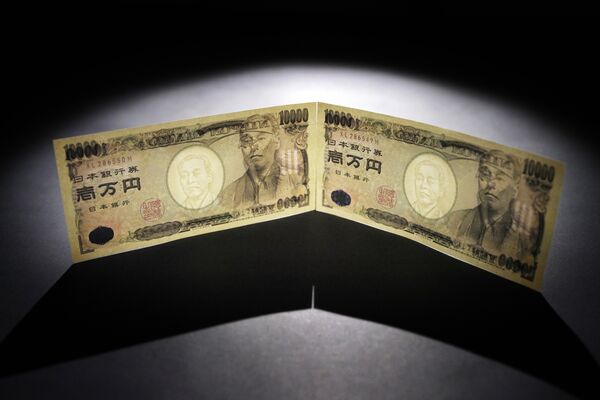 Japanese Banknotes As Yen Continues to Slide