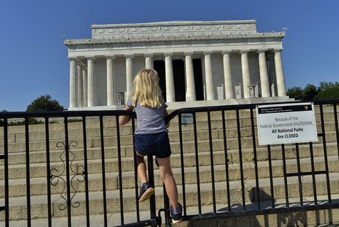 A child stands on a barricade around the Lincoln Memorial in Washington, in October 2013.