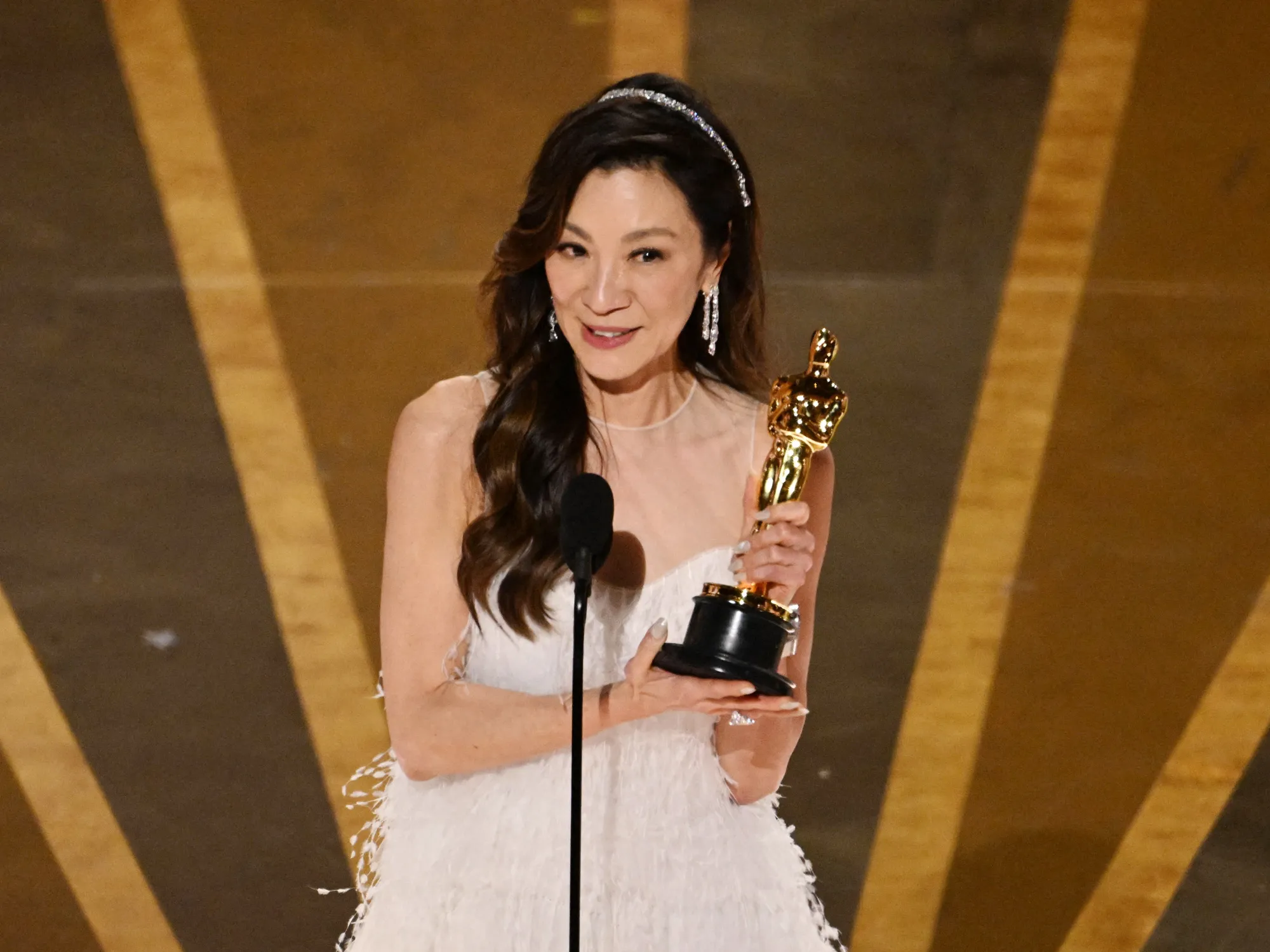 Michelle Yeoh accepts the Oscar for Best Actress in a Leading Role at the Oscars on March 12.