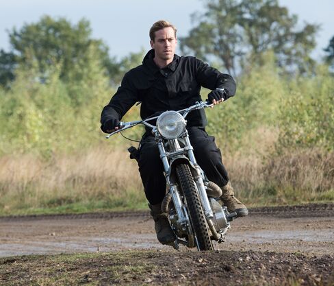 Like McQueen, agent Kuryakin races a custom Métisse moto.