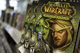 Copies of the 'World of Warcraft' computer video game sit on