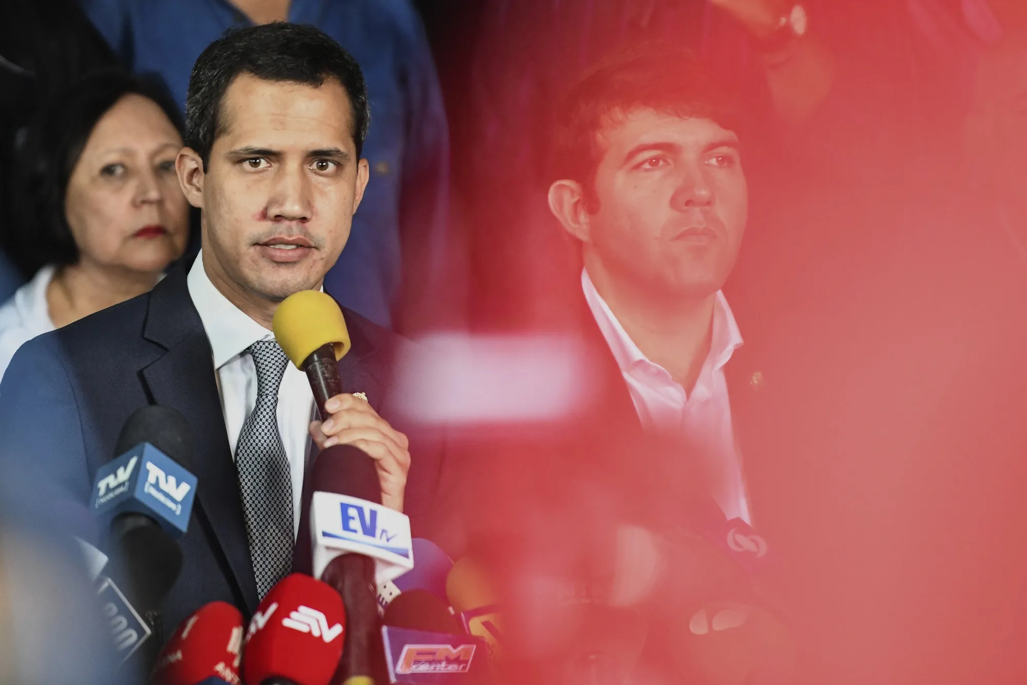 Juan Guaido, left, speaks during a press conference in the Los Palos Grandes neighborhood of Caracas.