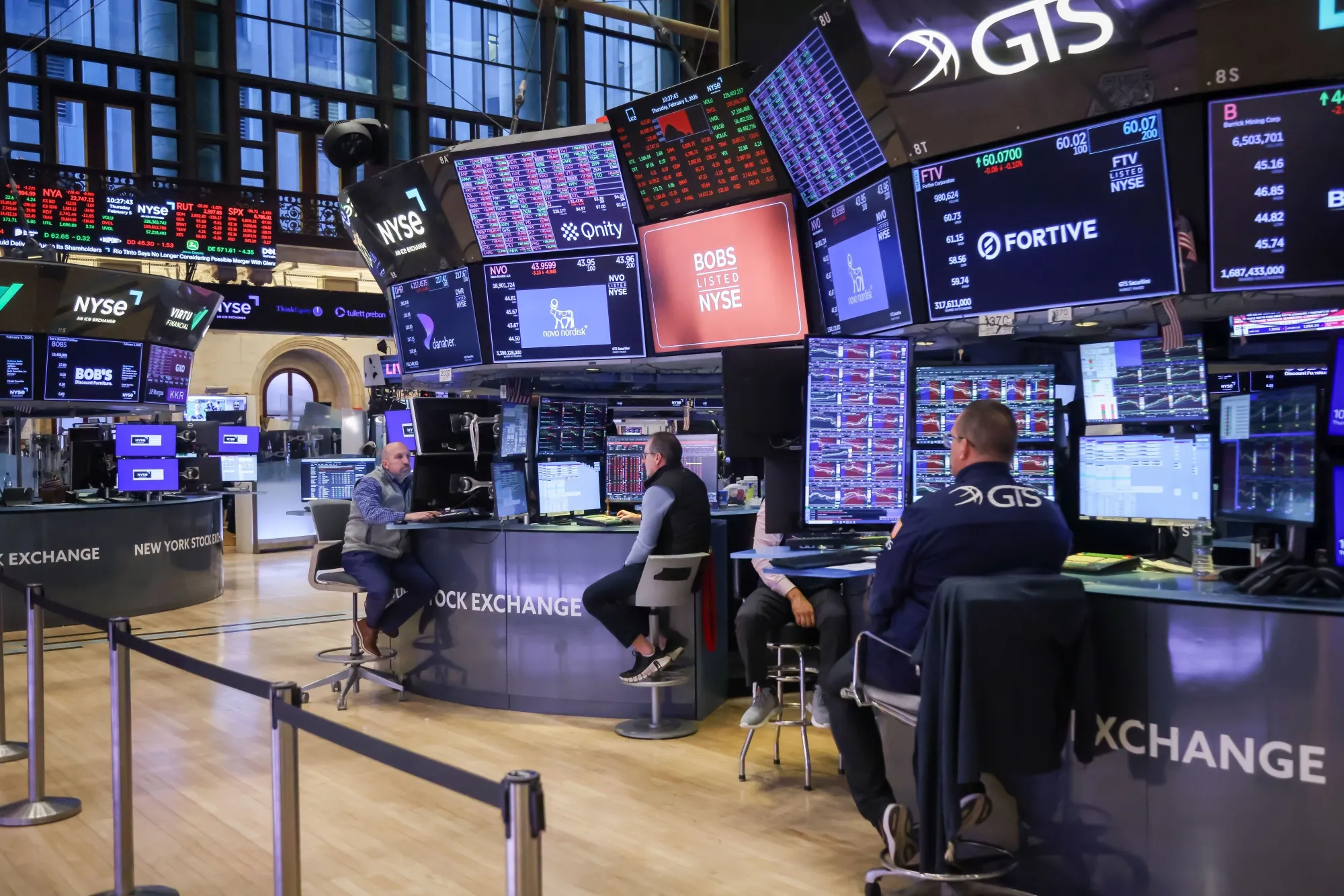Traders work on the floor of the New York Stock Exchange.