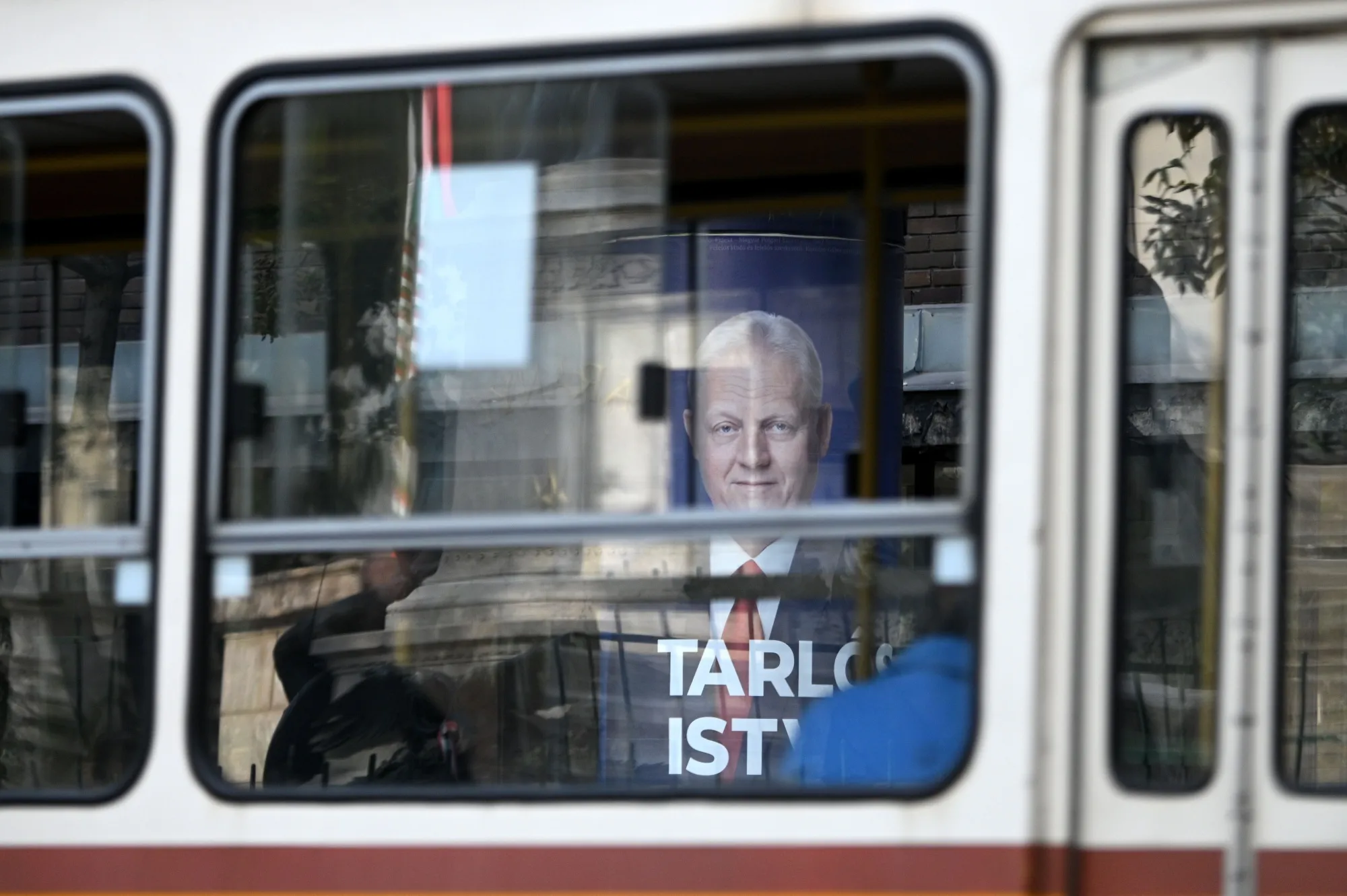 A campaign billboard of the city mayor Istvan Tarlos is seen through a tram window in Budapest on Oct. 9.