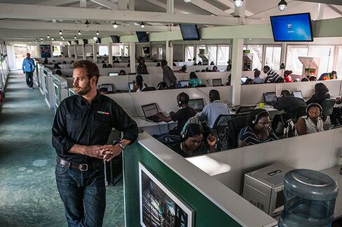 Moore in the customer care call-in center at M-Kopa headquarters in Nairobi.