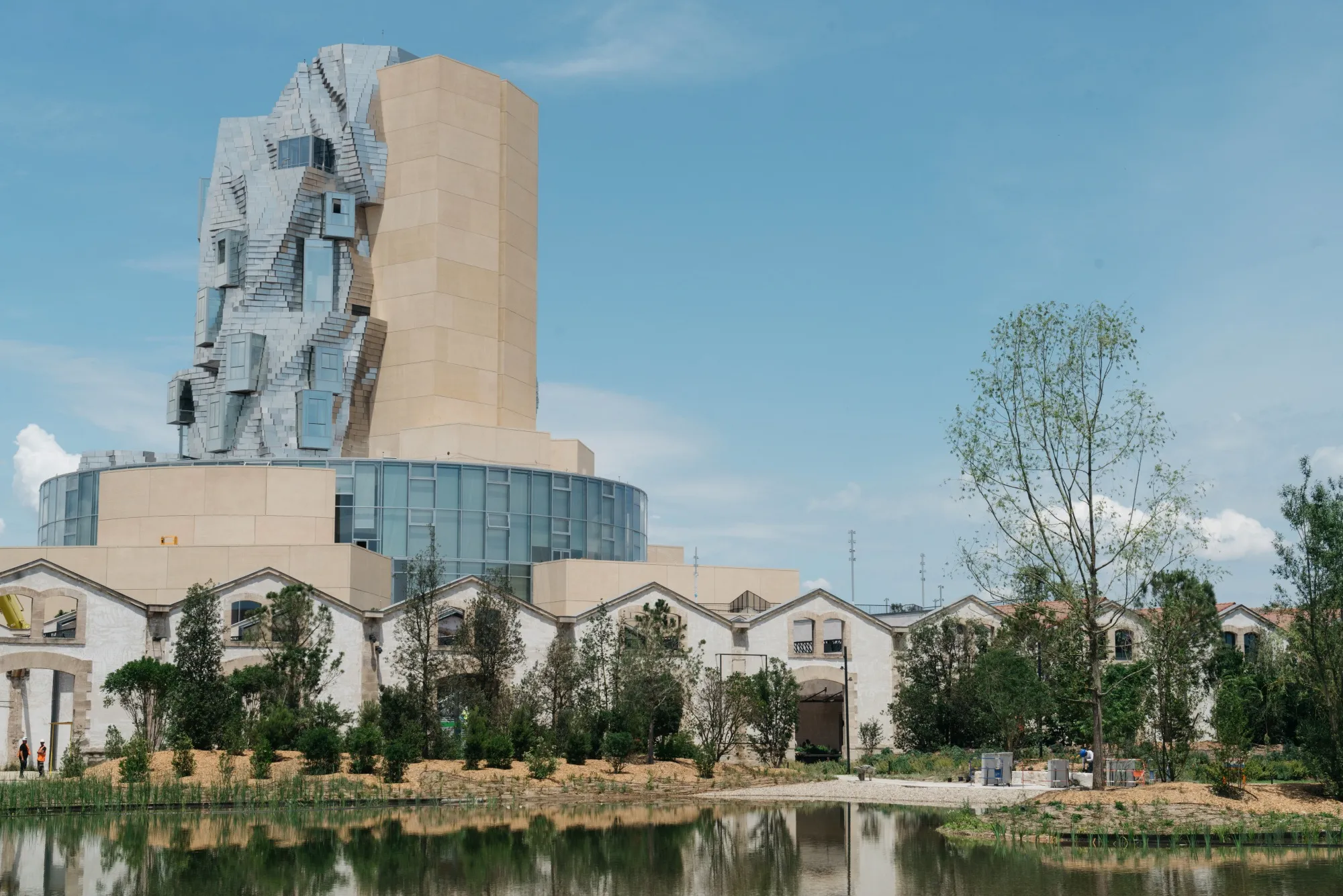 Frank Gehry’s tower overlooks a park.