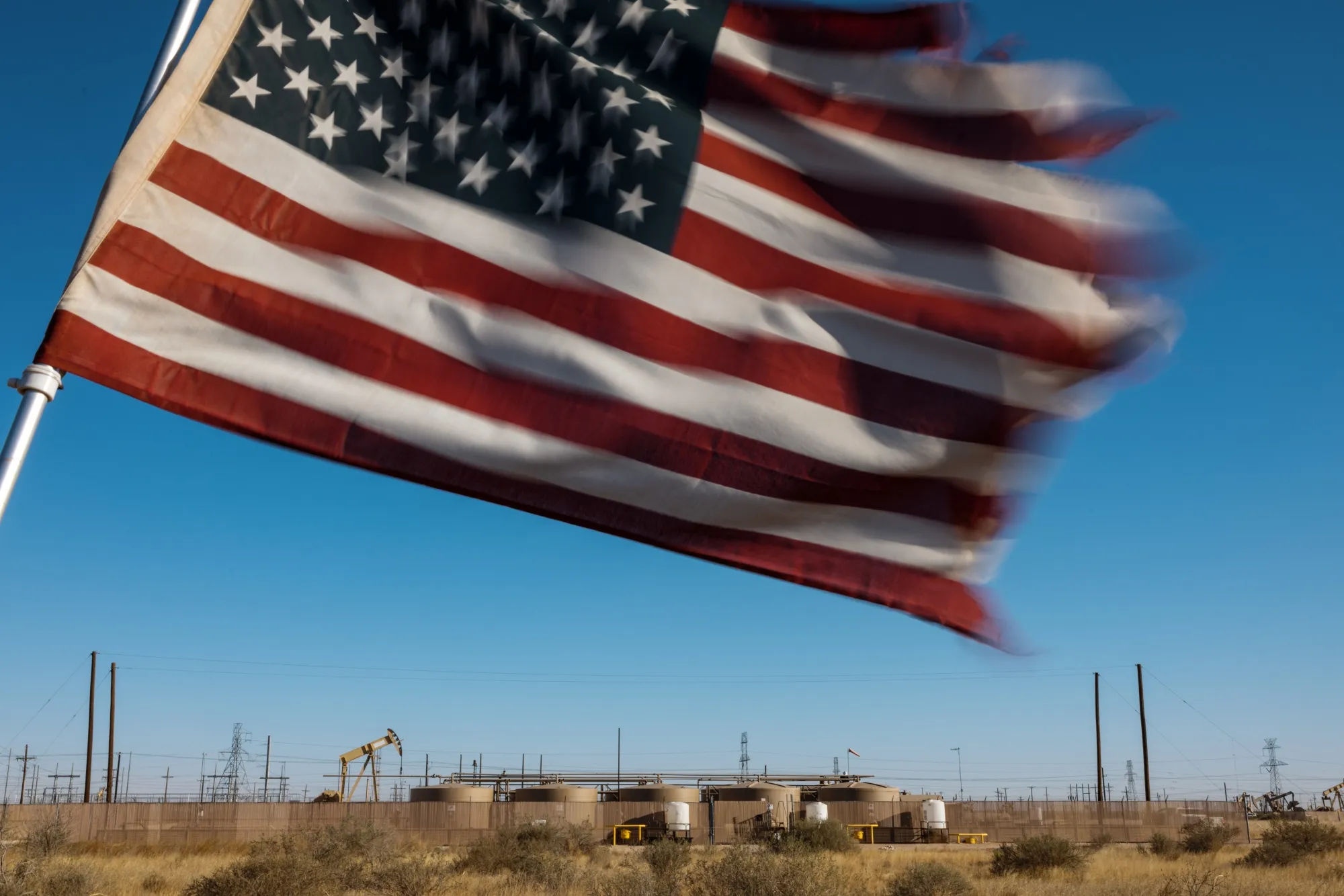An American flag at the entrance to an oil lease in Odessa,&nbsp;Texas.