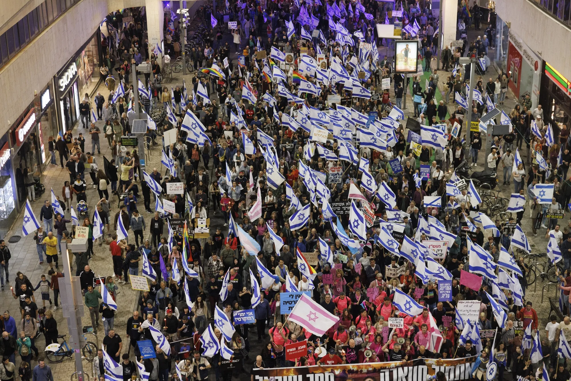 Demonstrators attend a weekly protest against Prime Minister Benjamin Netanyahu's government plans to overhaul the judicial system in Tel Aviv, Israel, on&nbsp;March 4.