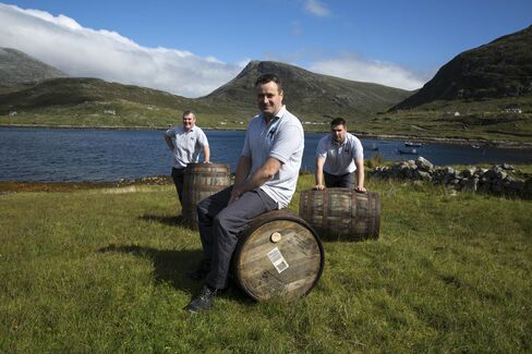 A few of the Harris distillers from the warehouse at Ardhasaig, overlooking the North Harris Hills and the Atlantic Ocean.