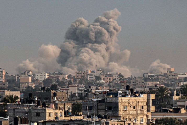 Smoke rises following an Israeli bombardment in Khan Yunis, Gaza, on Jan. 15.