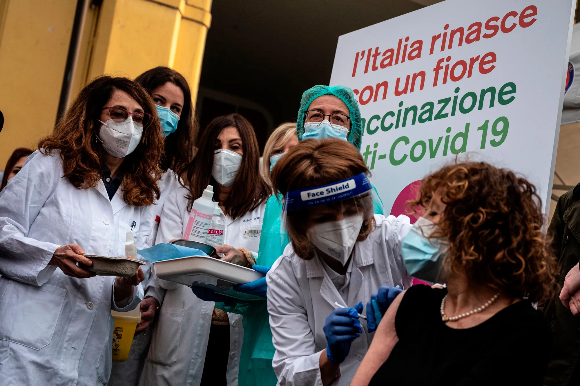 Health workers receive the Pfizer-BioNTech&nbsp;Covid-19 vaccine&nbsp;in Turin, Italy, on Dec. 27.