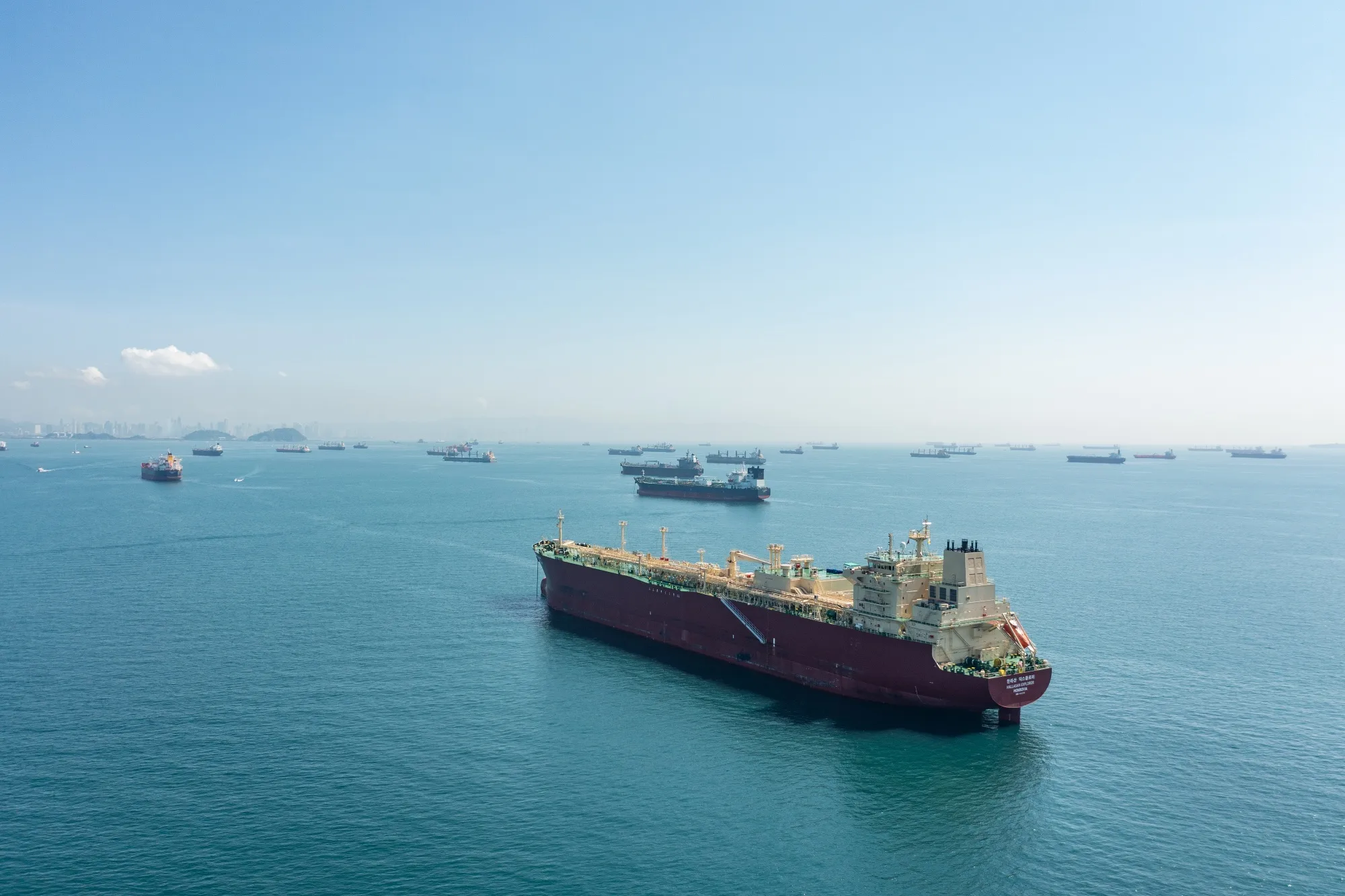 Cargo ships wait in the anchor zone to cross the Panama Canal near Panama City, Panama.