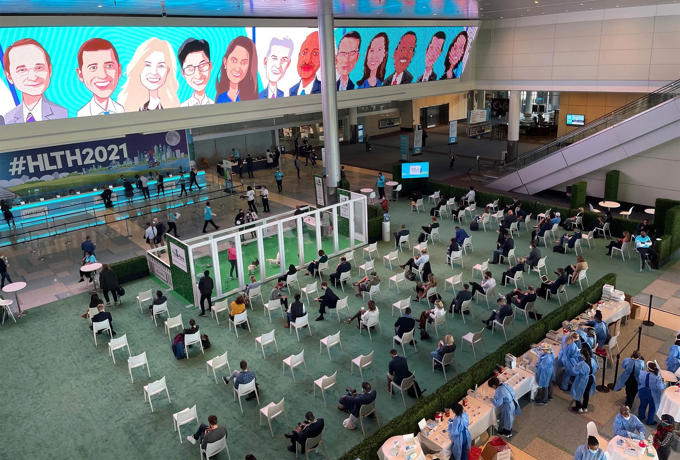 Attendees wait for Covid-19 test results at the HLTH conference in Boston, Mass., on Oct. 17, 2021.