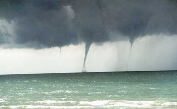 Four waterspouts spin over Lake Huron near Kincardine, Ontario, in 1999.