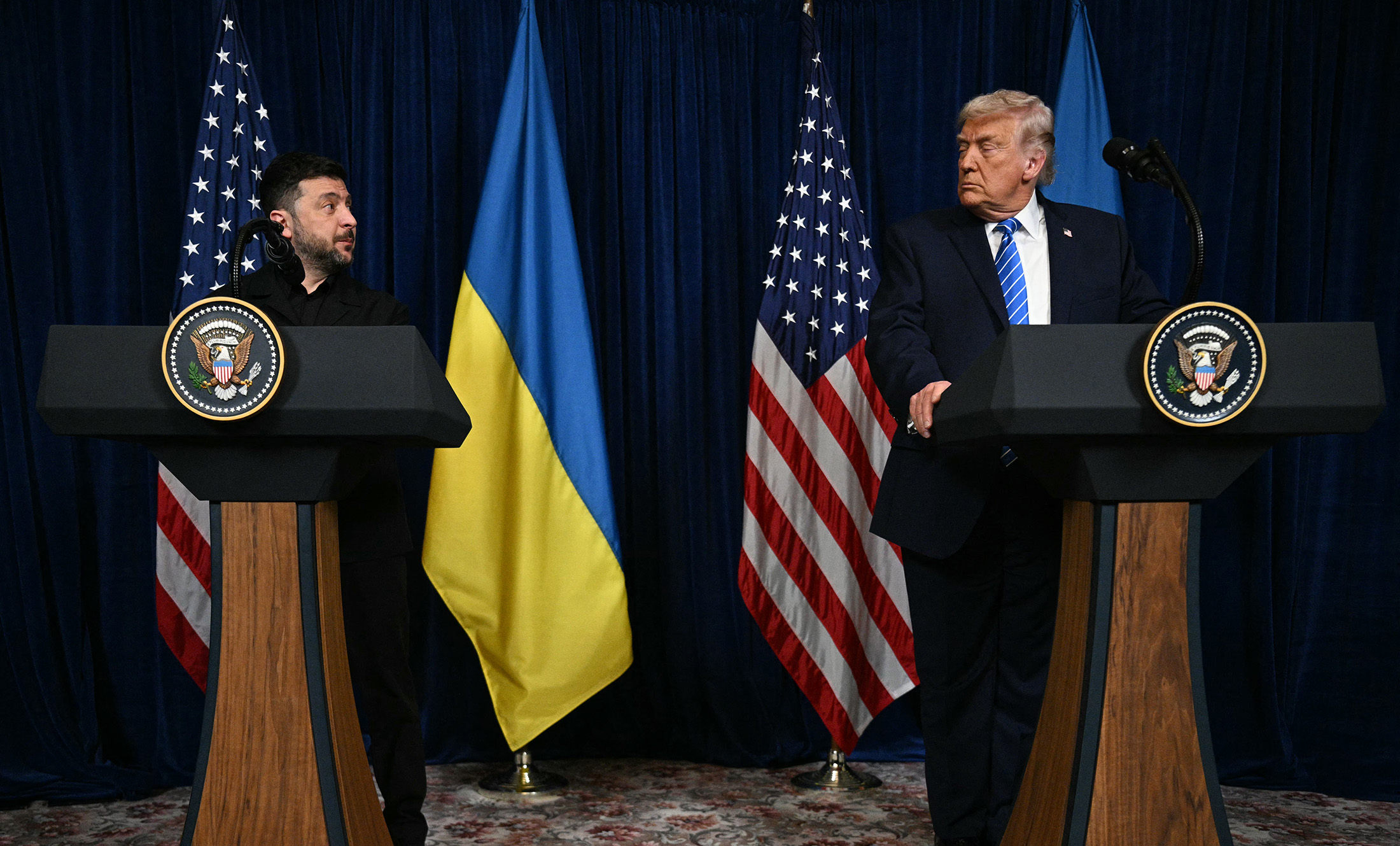Presidents Donald Trump, left, and Volodymyr Zelenskiy hold a press conference following talks at Mar-a-Lago in Palm Beach, Florida, on Dec. 28, 2025. Photographer: Jim Watson/AFP/Getty Images
