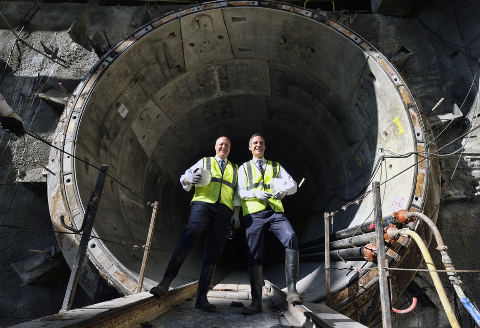 New Orleans Mayor Mitch Landrieu, left, is shown with Los Angeles Mayor Eric Garcetti, right, during a tour of a metro rail construction site in downtown Los Angeles. Not all mayors are likely to be smiling at leaked details on the White House's infrastructure plans.