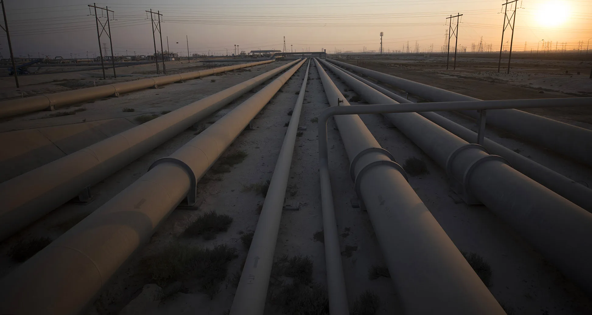 Oil pipelines run through the Juaymah Tank Farm in Ras Tanura, Saudi Arabia.