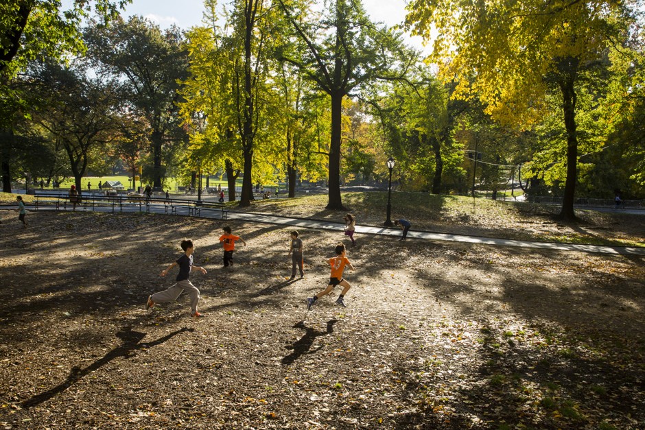 Children run in Central Park.