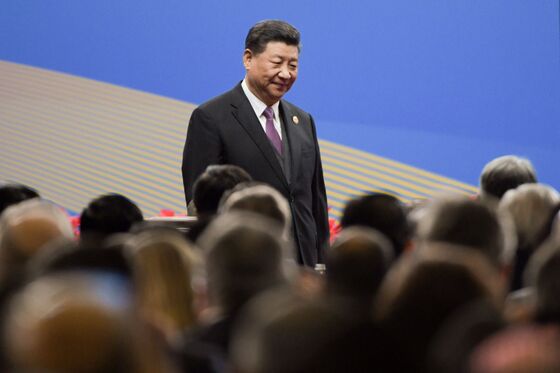 Yuan Rises as China Sets Strong Fix, Xi Vows No Harmful Weakness