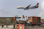 A Jet Airways India Ltd. aircraft prepares to land at Chhatrapati Shivaji International Airport in Mumbai.