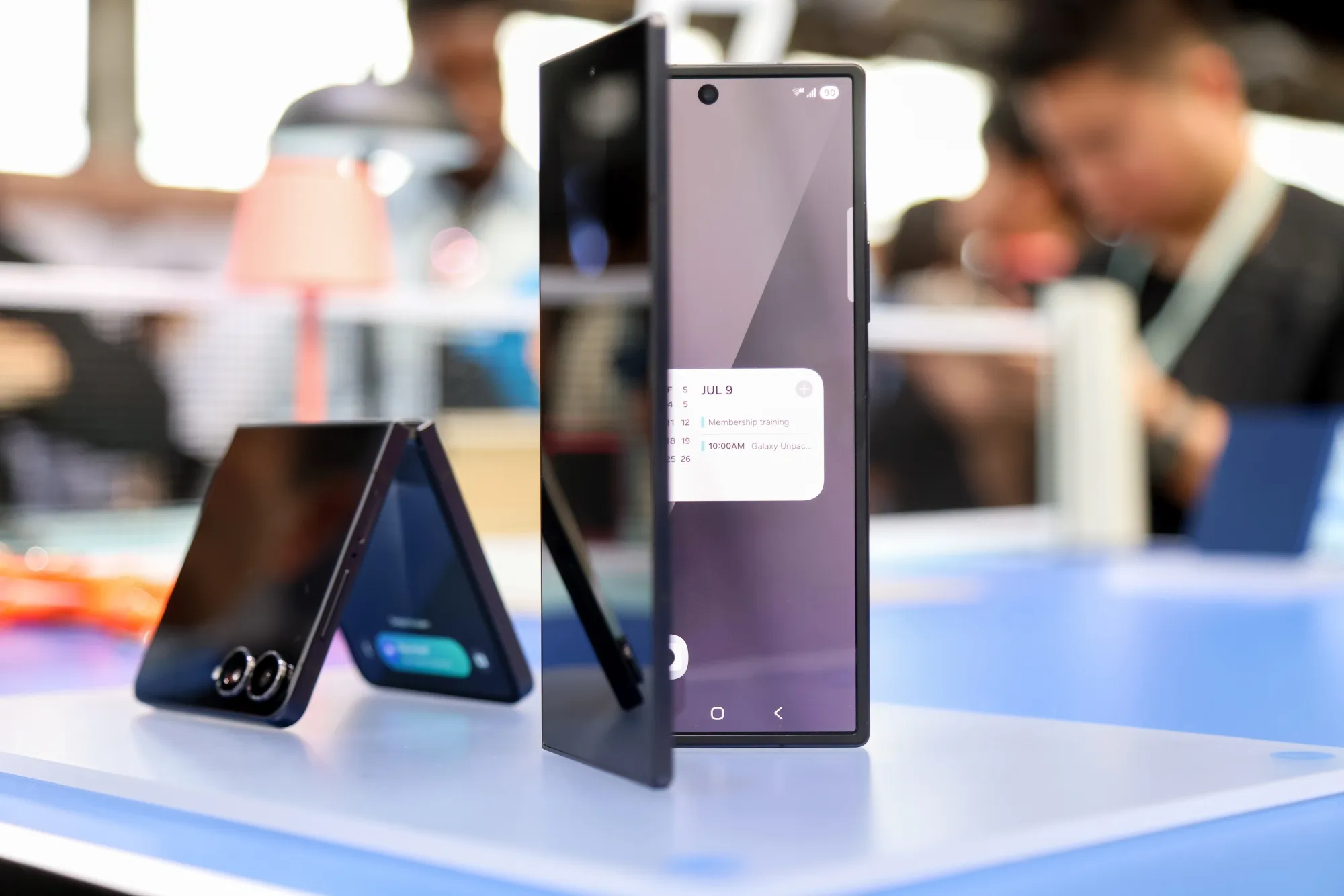 A Samsung Galaxy Z Flip 7 and Galaxy Z Fold 7.