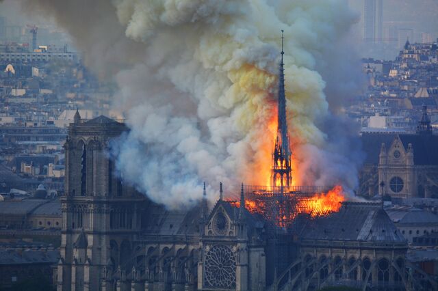 Smoke and flames rise from the cathedral during the fire on April 15, 2019
