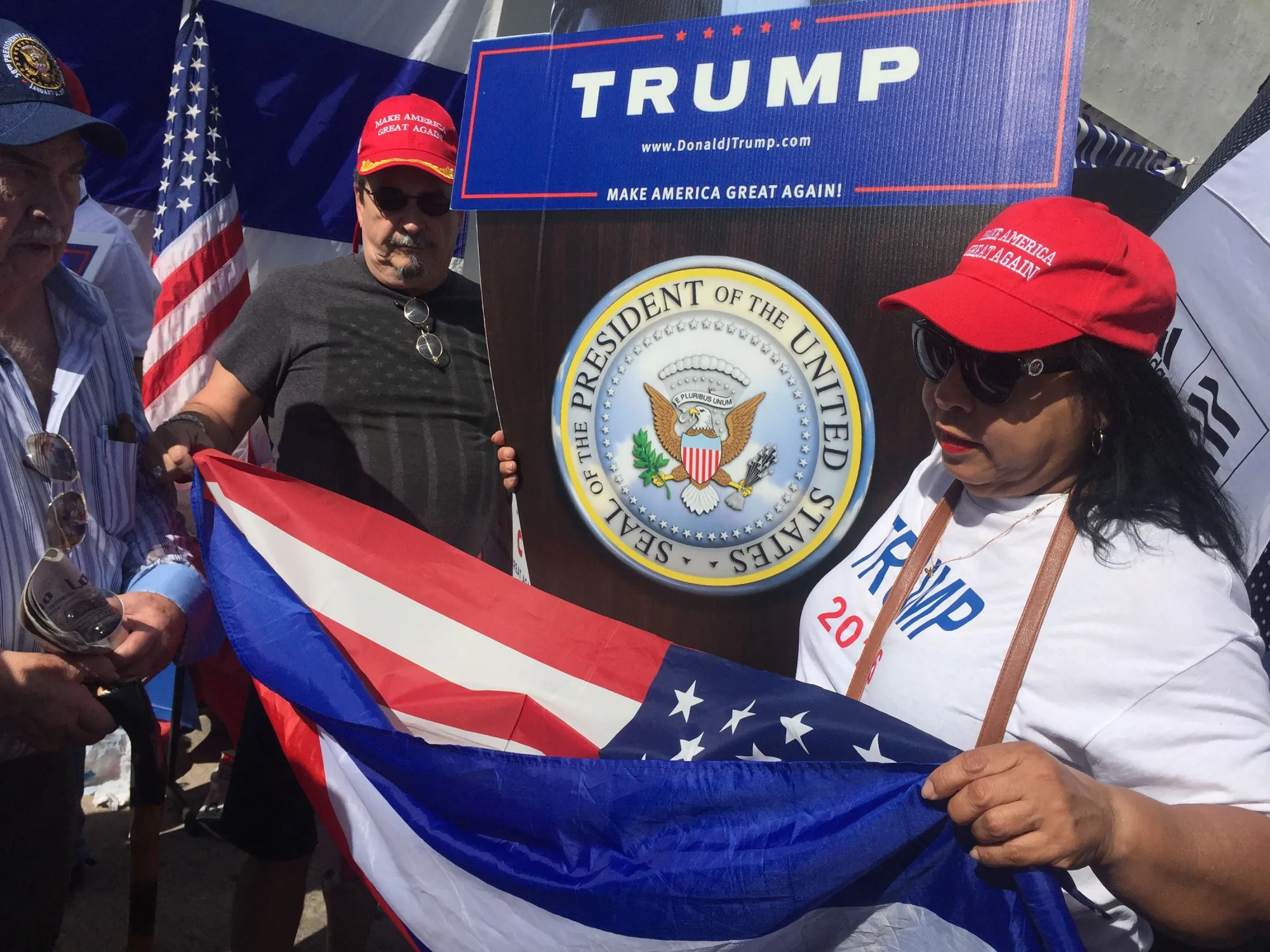 Cubans gather in Little Havana, in Miami, Florida, to watch the inauguration on Jan. 20, 2017.