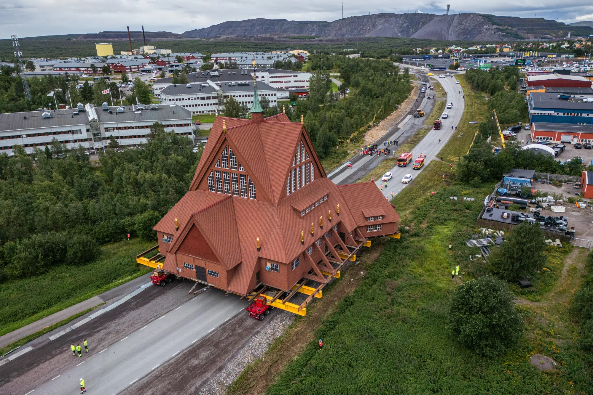 The wooden Kiruna Church is transferred to its new location, in Kiruna, Sweden, on Aug. 20, 2025.