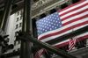 The American flag is displayed on the exterior of the New York Stock Exchange (NYSE) in New York.